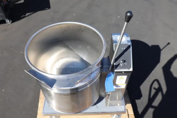 Cleveland KET-20-T 20 Gallon Electric Kettle, stainless steel, tilting, new condition, with control lever and visible serial number tag.