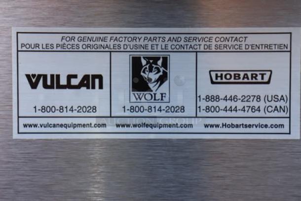 Sticker showing contact information for Vulcan, Wolf, and Hobart service, including phone numbers and websites.
