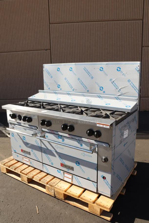 Brand new Wolf by Vulcan C60SS-10BN range with 10 burners, 2 ovens; back riser dented/scratched. Includes original labeling.
