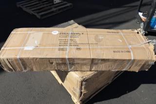 Brand new, unopened Regency FTG-1248 12"x48" stainless steel floor trough with grate. Packaging is visibly damaged.