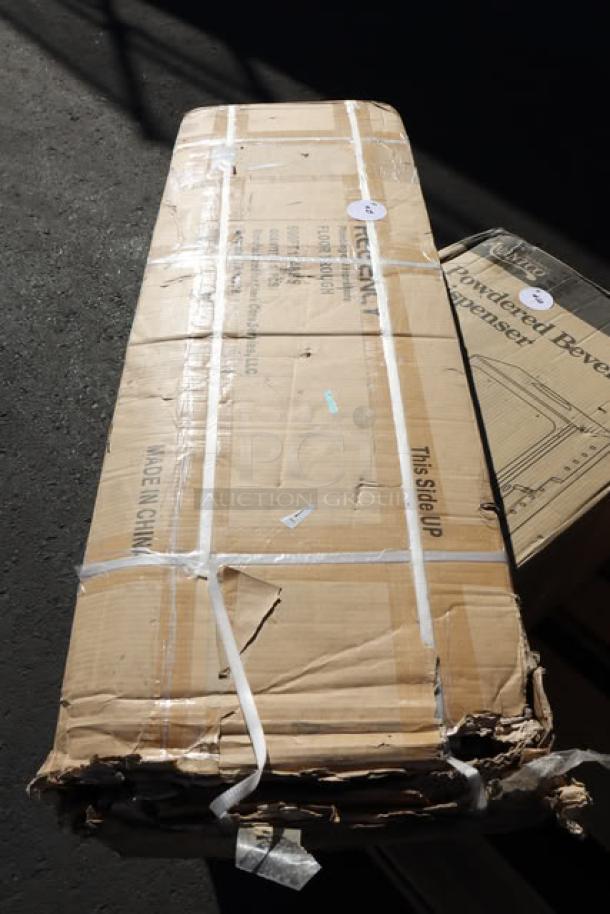 BRAND NEW Regency FTG-1248 12" x 48" stainless steel floor trough, unopened in damaged packaging.