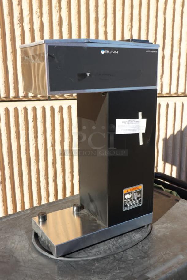 Brand new Bunn 33200.0010 VPR-APS Pourover Airpot Coffee Brewer, black and silver, minor scratches, 120V, labeling visible.