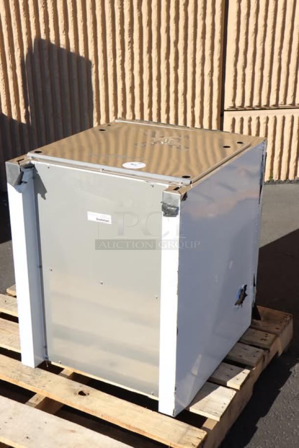 Brand new Scotsman HST21-A stainless steel ice dispenser stand. Enclosed with door, minor scratches. Measures 21.5" x 23.75". Serial 25061320014048.