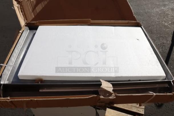 Brand new Assure Parts 177AOGT3627 6 burner griddle top, 35 7/8" x 27" x 4", original packaging damaged.