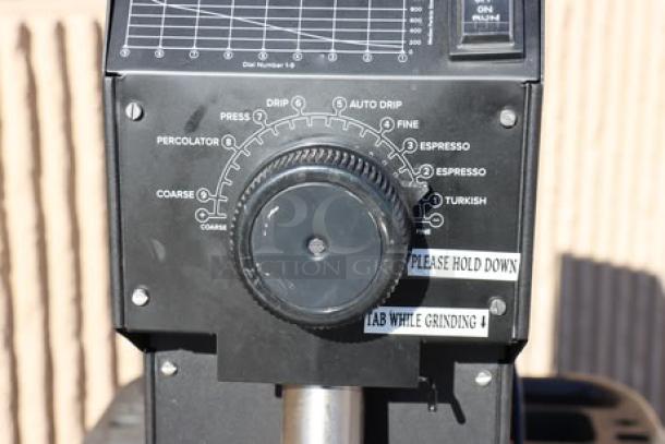 Brand new Avantco BCG3 3 lb. bulk coffee grinder, model BCG3, 110V. Scratch-n-dent condition, grinding settings visible. Serial #10U0006162.