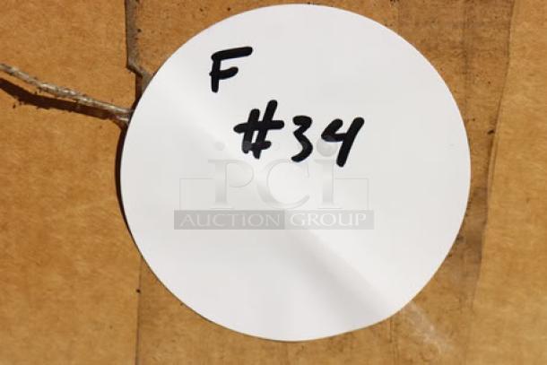 Brown box with label "F #34," indicating auction lot number for Vollrath CO4-208240FS convection oven.