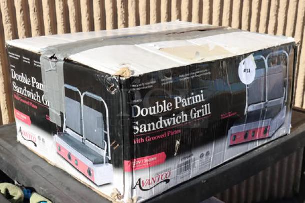 Avantco PG400 dual panini grill, new, with grooved plates, 19 5/8" x 9 1/8" cooking surface, 120V, 3500W, damaged packaging.