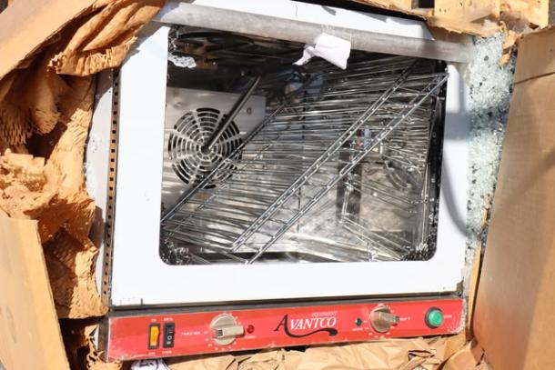 Avantco CO-32M half-size convection oven with moisture injection, 2.3 cu. ft., 208/240V, 2100/2800W. Broken glass door.