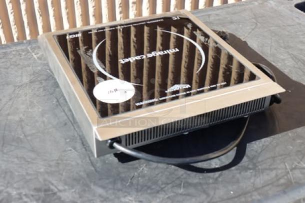 Brand new Vollrath 59300 Mirage Cadet Induction Range, 1800W, 120V, countertop model. Serial number: 0145-01560459-051.