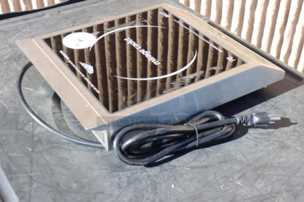 Brand new Vollrath 59300 Mirage Cadet induction range, 1800W, 120V. Sleek design, pristine condition, with power cord.