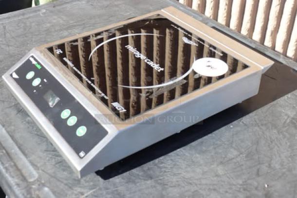 BRAND NEW Vollrath 59300 Mirage Cadet Countertop Induction Range, 1800W, 120V, with control panel and display. S/N: 0145-01560459-051.