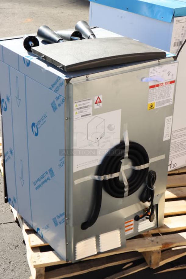 BRAND NEW Manitowoc UDE0065A-161B ice machine, 57 lb, 31 lb bin, serial: 1121289586, air-cooled, scratch-n-dent condition.