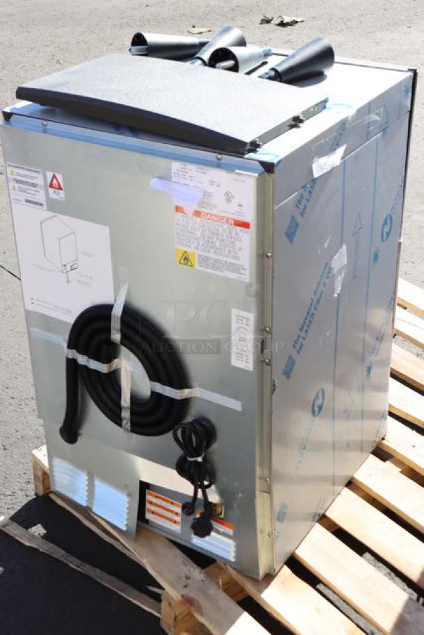 BRAND NEW Manitowoc UDE0065A-161B ice machine, air-cooled, undercounter, 57 lb. bin, 115V, visible warning labels, minor scratches.