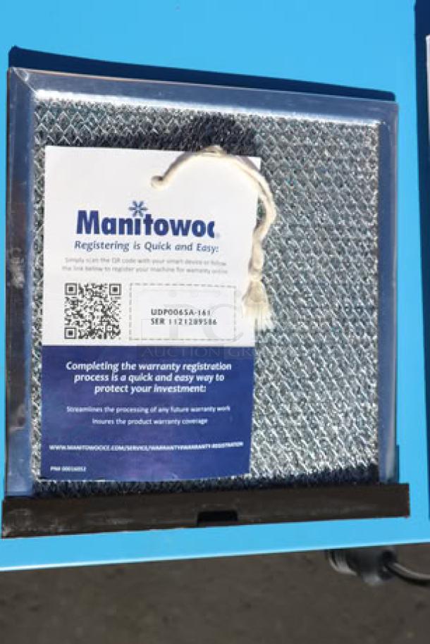 Brand new Manitowoc UDE0065A-161B ice machine, air-cooled, with 31 lb. bin, scratch-n-dent condition, serial 1121289586.