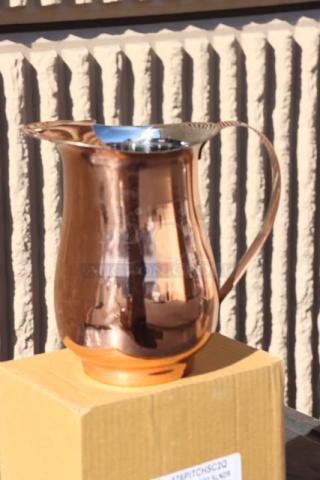 Brand new Acopa 64 oz. satin copper stainless steel bell pitcher with ice guard, model 176PITCHSC2Q, on box.