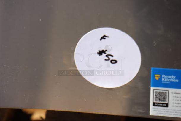 Cooking Performance Group FCPG15 countertop fryer, 26,500 BTU, 15 lb capacity. Label shows price tag '$50'.