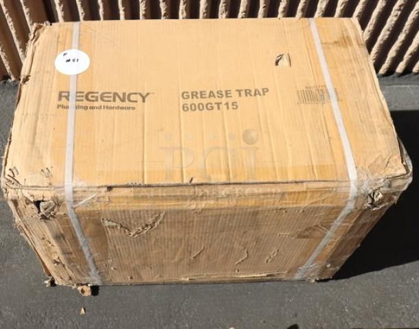 Regency 600GT15 grease trap in original packaging, minor box damage. 30 lb, 15 GPM, 2" non-threaded connections, PDI certified.