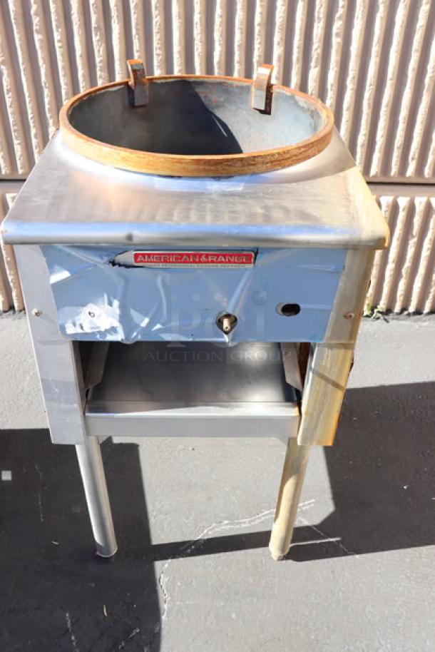 American Range ARWR-J16 Natural Gas Jet Wok Range with 16" Ring, shown outdoors. Features a stainless steel body and a visible burner ring.