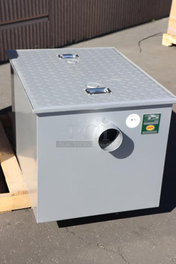 "Regency 600GT50 grease trap, 100 lb., 50 GPM, PDI certified, new condition, non-threaded 4-inch connections, gray finish."