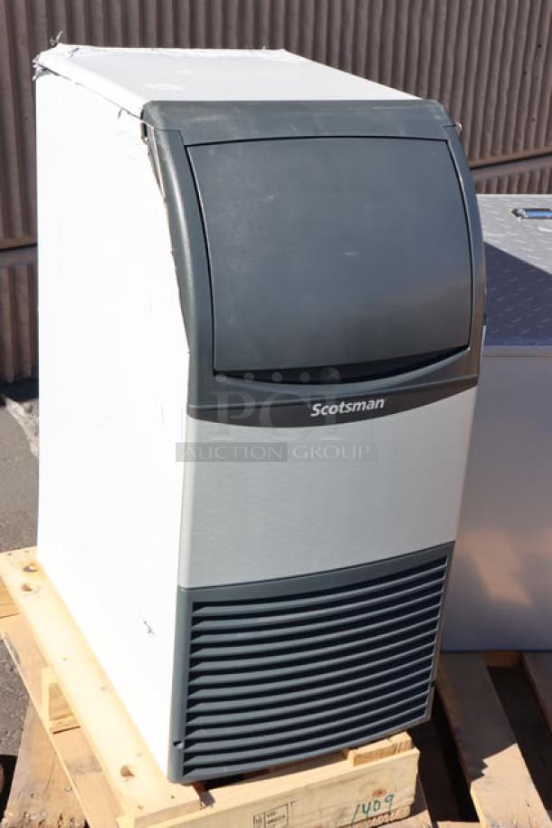 BRAND NEW Scotsman CU0715MA-1 ice machine, 15" air-cooled, 80 lb capacity, dented back corner, serial 25041320013737.