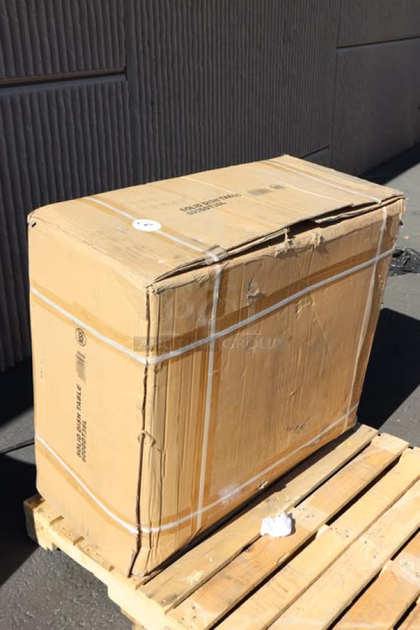 Regency SDT-36L dirty dish table in unopened box on pallet, showing shipping wear. Brand new, 16 gauge, left drainboard.
