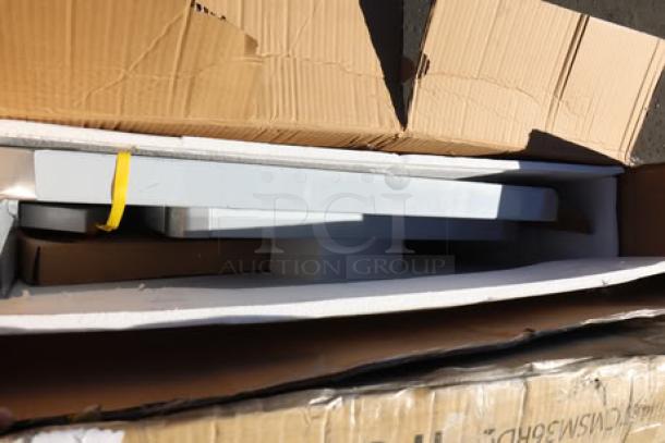 BRAND NEW Regency WT-243038-S 30"x24" stainless steel table in damaged packaging, may have scratches/dents, missing parts.