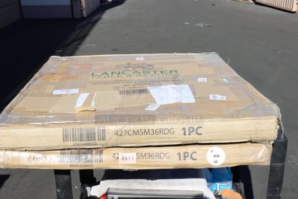BRAND NEW Lancaster Table & Seating 427CMSM36RDG Harbor Gray 36" round outdoor table in damaged packaging; may have scratches.