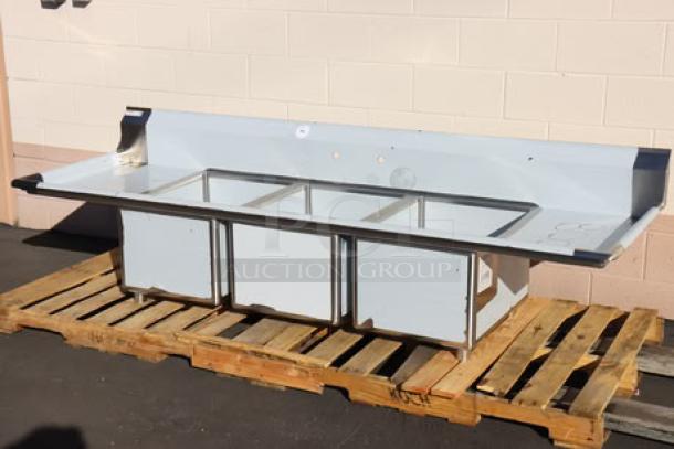 Brand new Regency 94" 16-gauge stainless steel 3-compartment commercial sink, model 600S31824218, with 2 drainboards.