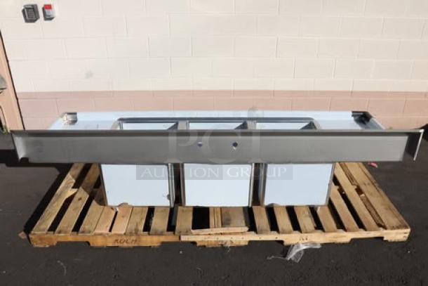 Brand new Regency 94" stainless steel 3-compartment sink, galvanized legs, 2 drainboards, minor scratches/dents, model 600S31824218.