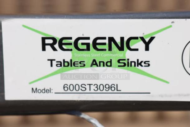 Regency 30" x 96" stainless steel work table with left sink, model 600ST3096L, out of packaging.