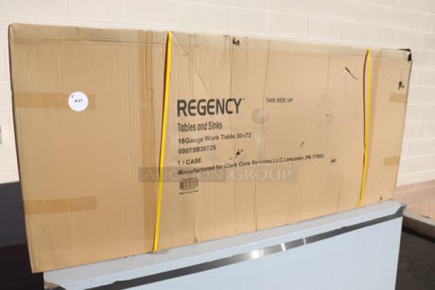 Regency WT-723038-S-16 30" x 72" stainless steel work table, 16-gauge, with 4" backsplash and undershelf, in original packaging.