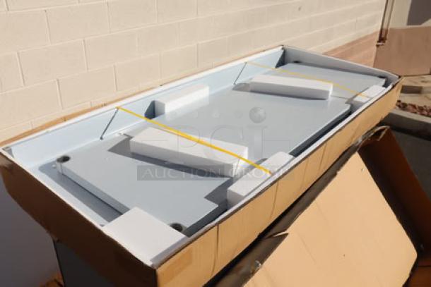 Brand new Regency WT-723038-S-16 stainless steel work table, 30" x 72", 16-gauge, with 4" backsplash, undershelf, original packaging.