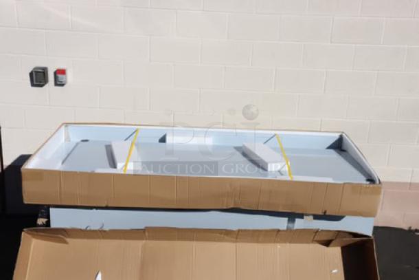 Regency WT-723038-S-16 stainless steel work table, 30" x 72", 16-gauge, with 4" backsplash and undershelf, in original packaging.