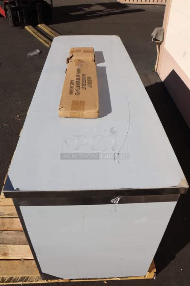 Brand new Regency C-2472-316 stainless steel table, 24"x72", enclosed base with sliding doors, adjustable shelf. Scratch-n-dent condition.