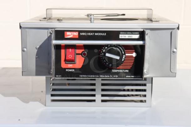 Brand new Metro MBQ-BQ1700 banquet cab module, S/N B17W - 9593. Out of original packaging, with power and temperature controls.