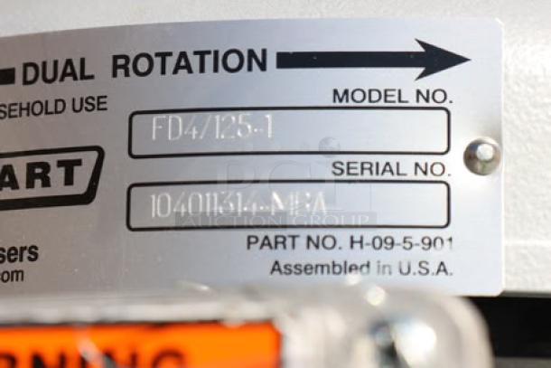 BRAND NEW Hobart FD4/125-1 Garbage Disposer, 1 1/4 hp, 208-240/480V. Serial No. 1040115|-ME3A, label visible.