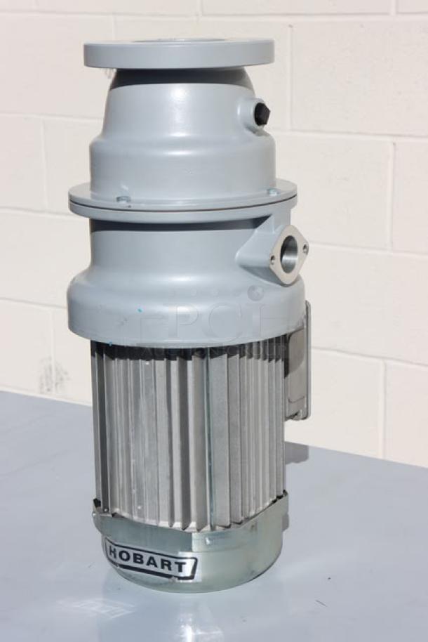 Brand new Hobart FD4/125-1 commercial garbage disposer, 1 1/4 hp, 208-240/480V, short upper housing, out of original packaging.
