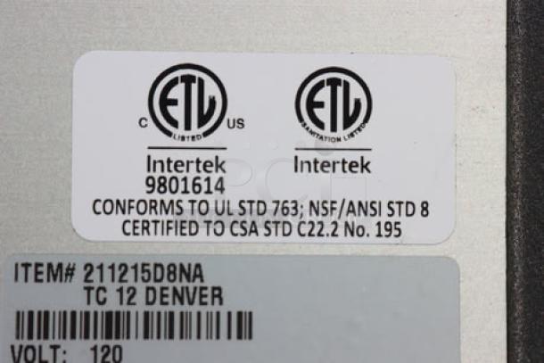 Sirman 211215D8NA TC #12 Denver electric meat grinder label, shows ETL certification and voltage details.
