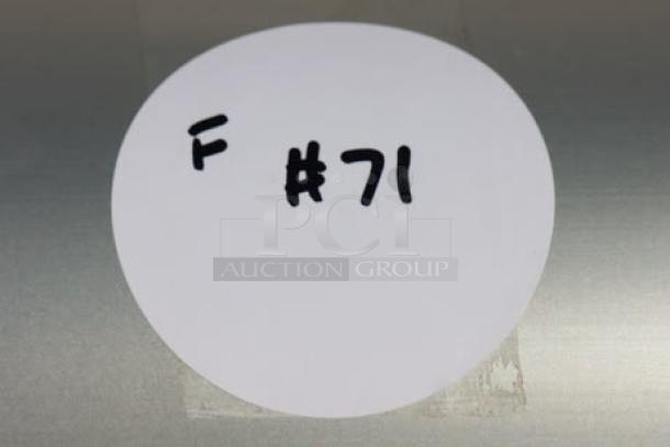 Alt text: White label on Sirman meat grinder reads "F #71."