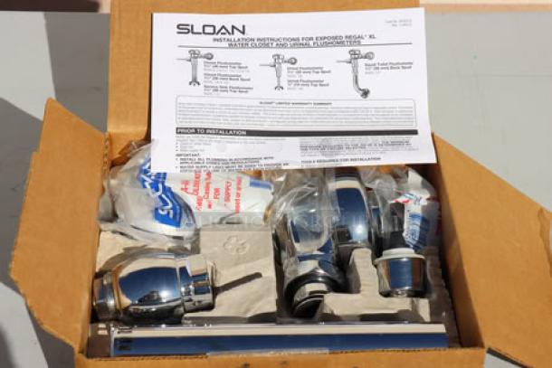 Brand new Sloan 3080050 Regal chrome flushometer, 1.28 GPF, with installation instructions in open box.