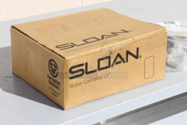 Brand new Sloan 3080050 flushometer box, unopened. Features include top spud connection, 1.28 GPF.