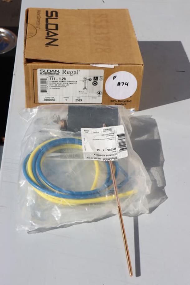 Brand new Sloan 3080050 Regal Flushometer, chrome, 1.28 GPF, top spud, single flush, manual, in original packaging.