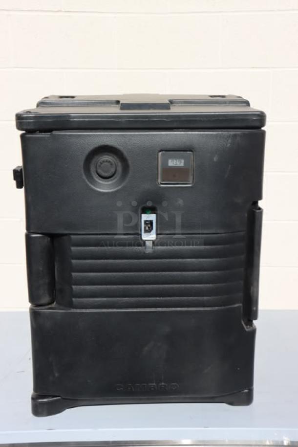 Brand new Cambro UPCH400110 black insulated electric food pan carrier, front loading, 6 full-size pan capacity.