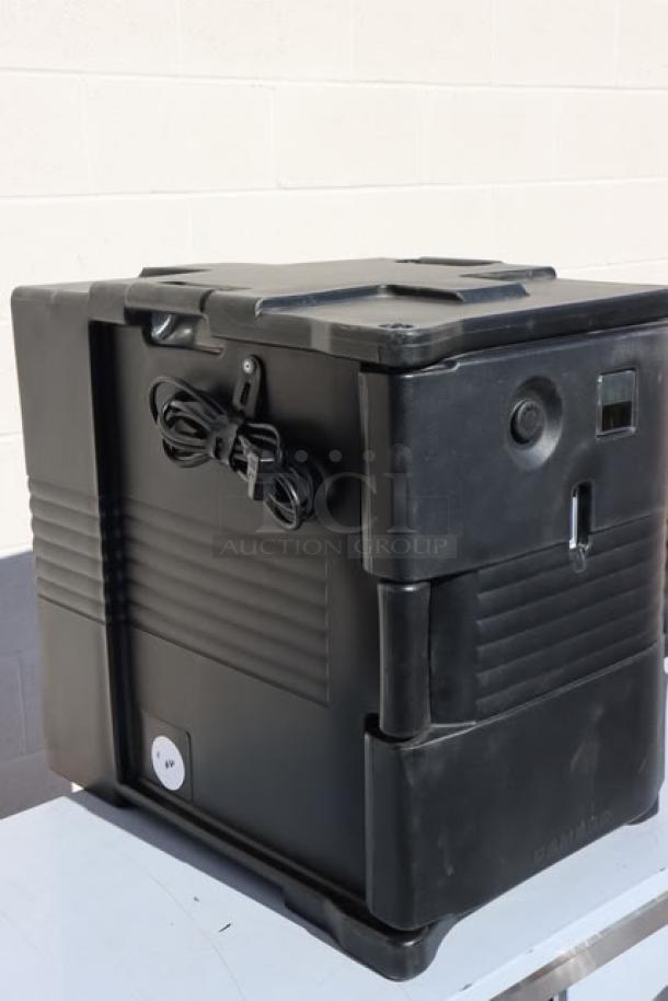 Brand new Cambro UPCH400110 black insulated electric food pan carrier, 6 full-size pan capacity, front-loading, 110V.