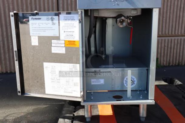 Brand new Dean by Frymaster SR114E electric floor fryer, 40 lb. capacity, open door view with visible schematics and labels.