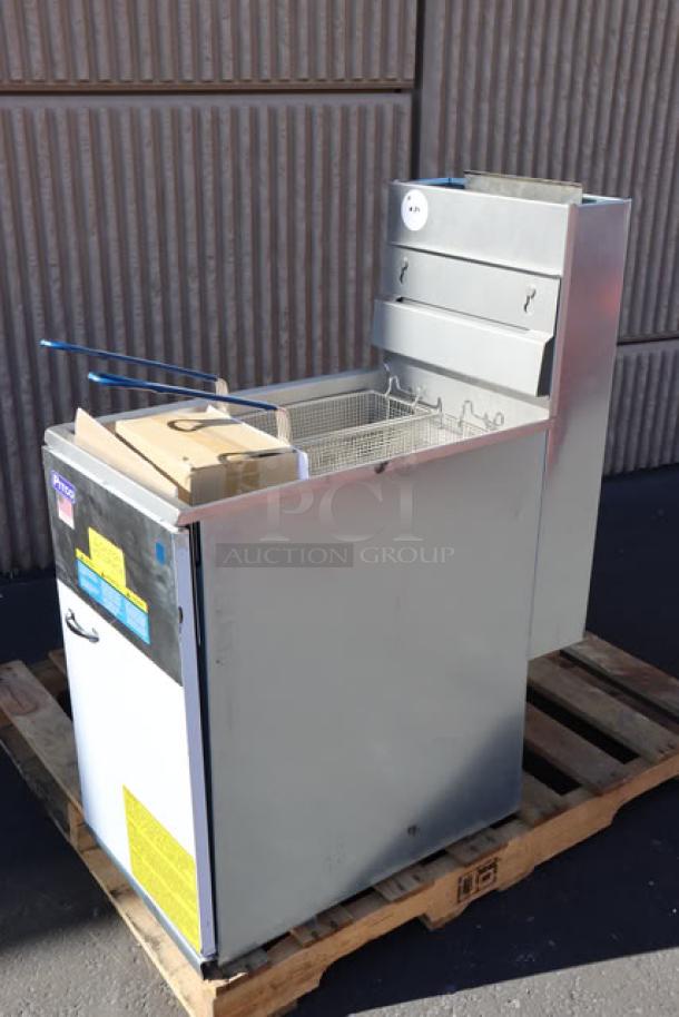 Brand new Pitco® 35C natural gas fryer, 35-40 lb. capacity, stainless steel, out of box, on a pallet.