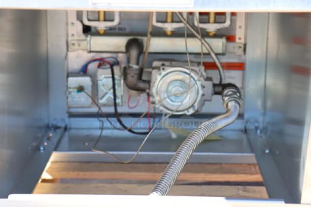 BRAND NEW Pitco® 35C Natural Gas Floor Fryer, stainless steel, 35-40 lb. capacity, internal component view, S/N: G25JA031791.