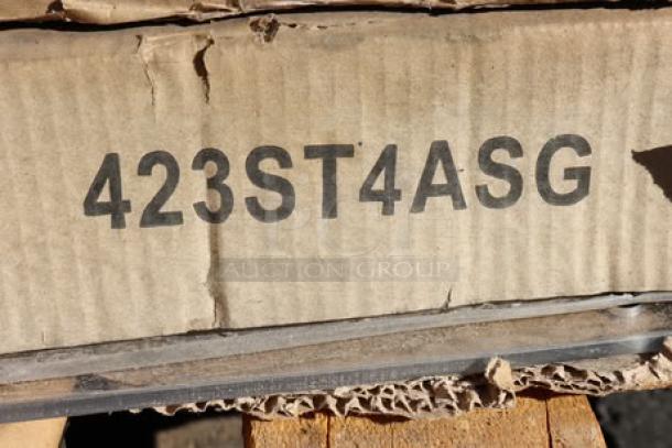 Damaged packaging showing code "423ST4ASG," part of a massive mixed lot auction including various new and used items.