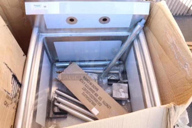Mixed lot of Regency stainless steel sinks and wire shelves in original packaging, condition appears new, some denting visible.