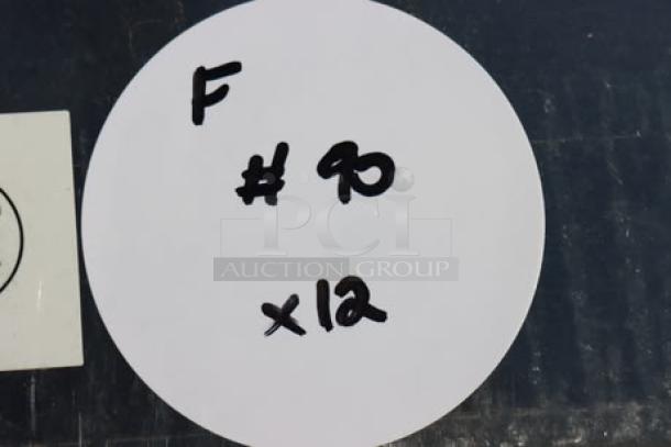 Auction lot label with "F #90 x12" handwritten on a white circle tag.